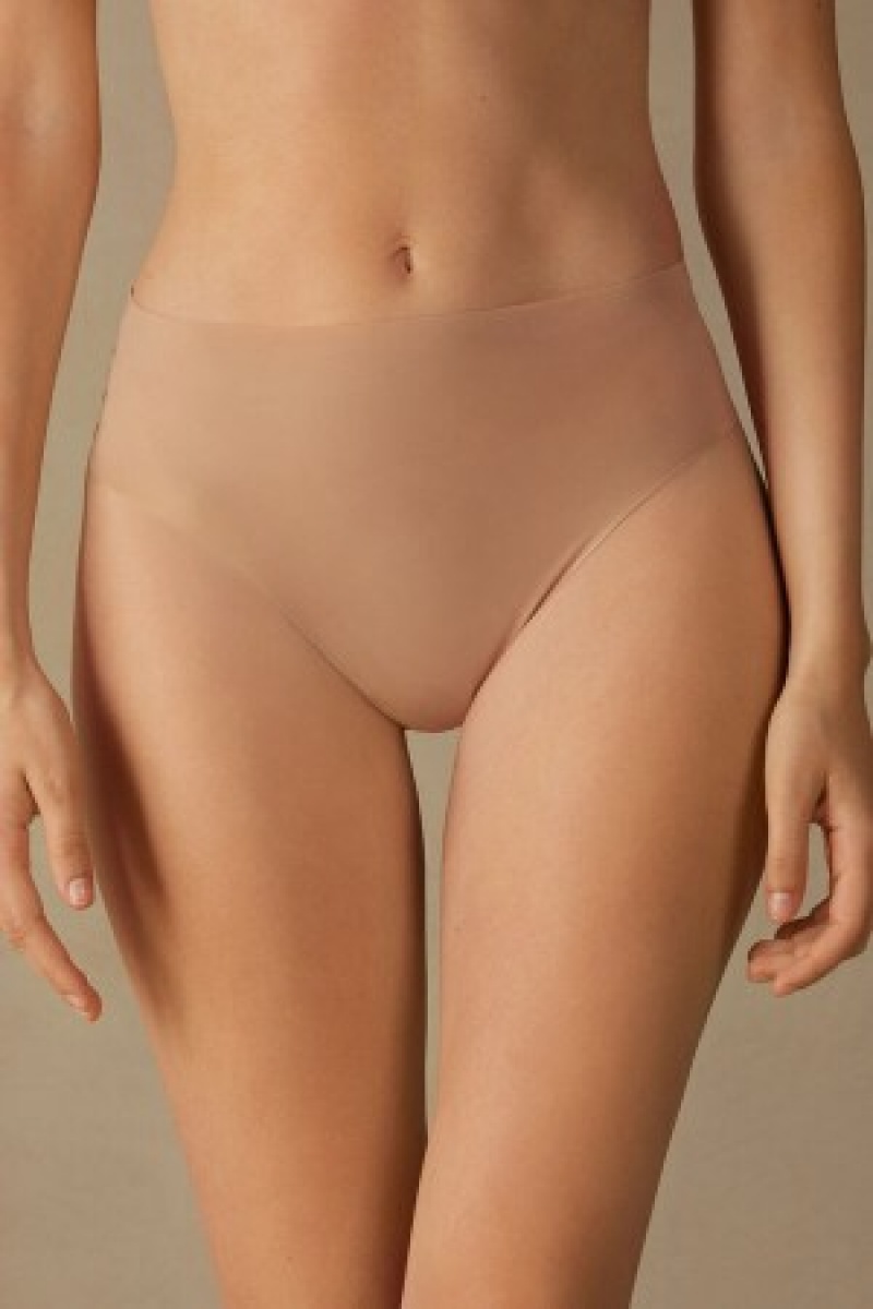 Intimissimi High Talje Thong in Seamless Ultralight Microfiber Natural | DKCIF80794